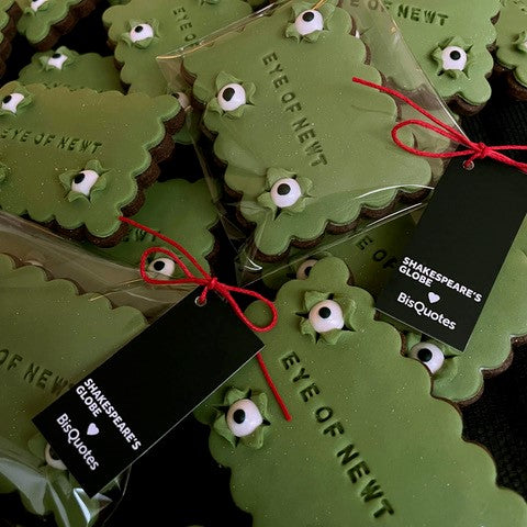 
                      
                        Green rectangular biscuits with white eyes popping out of the printed fondant
                      
                    