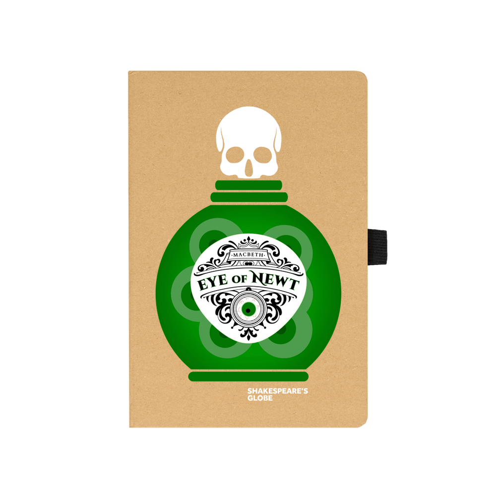 Kraft notebook with graphic depiction of green eye of newt bottle on the front, with black elastic closure on the side