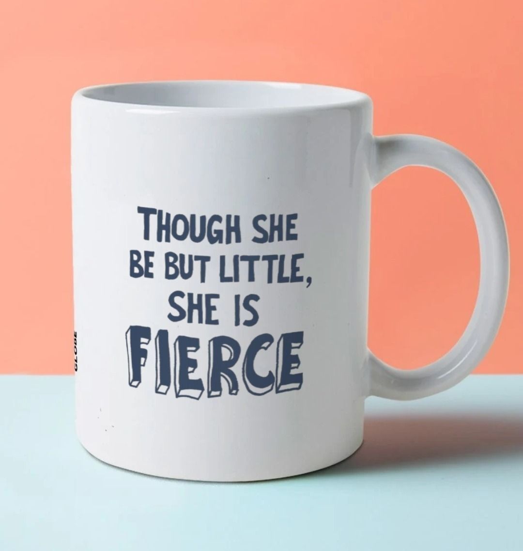 White mug with dark blue stylised 'fierce' quote graphics on either side