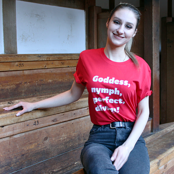 Red t-shirt with white graphic text down centre front