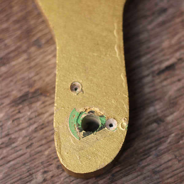 
                  
                    Plywood tree segment, painted gold, with jagged tree branches, from Much Ado About Nothing summer 2024 on the Globe Stage.
                  
                