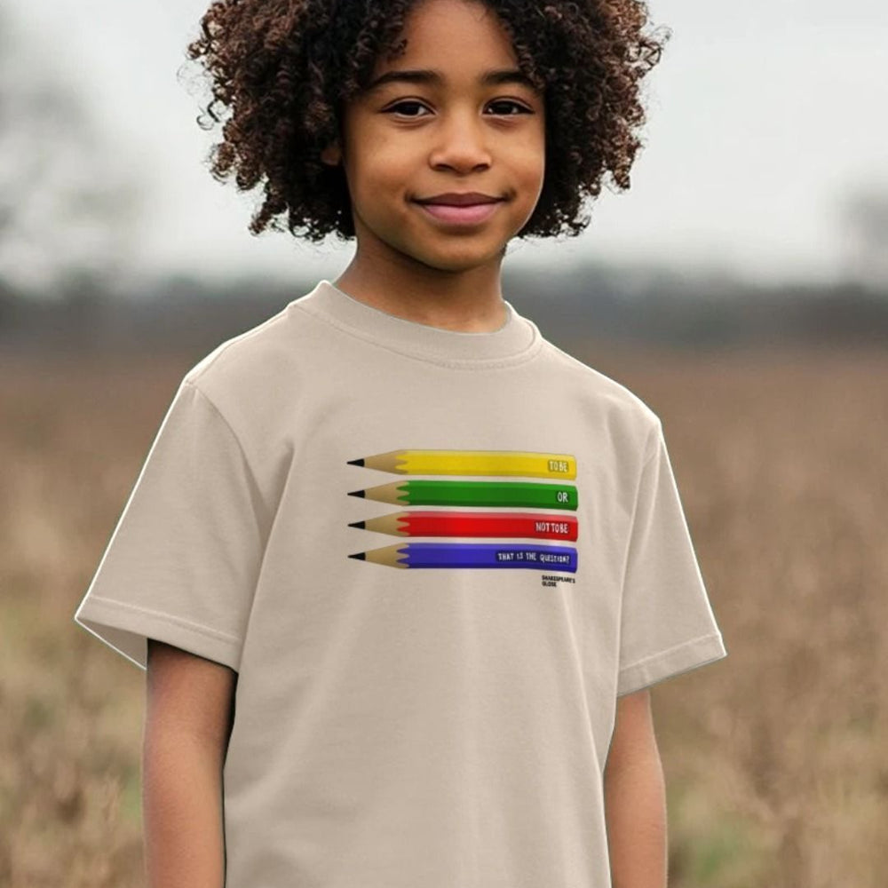 Beige children's t-shirt with centre front graphic of 4 pencils, one on top of the other yellow, green, red, blue with white graphic text on each one