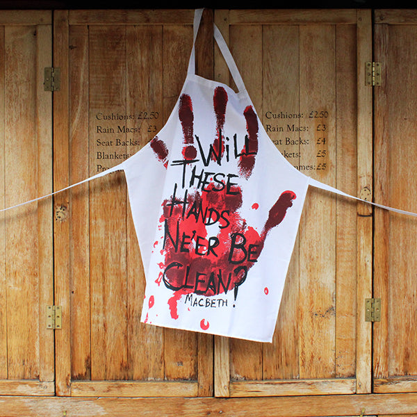 White apron with a bloody handprint design