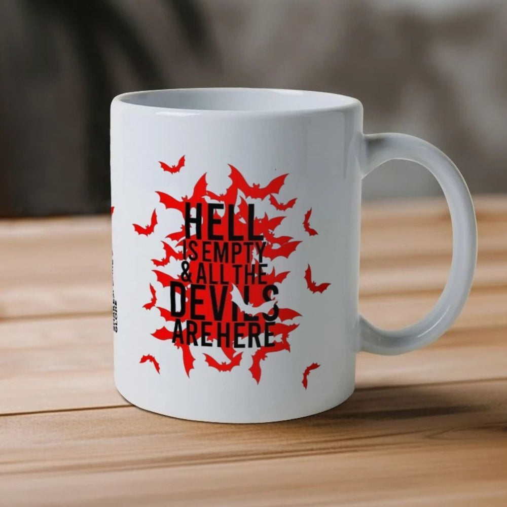 White mug with red bats graphic on either side, with black text overtop