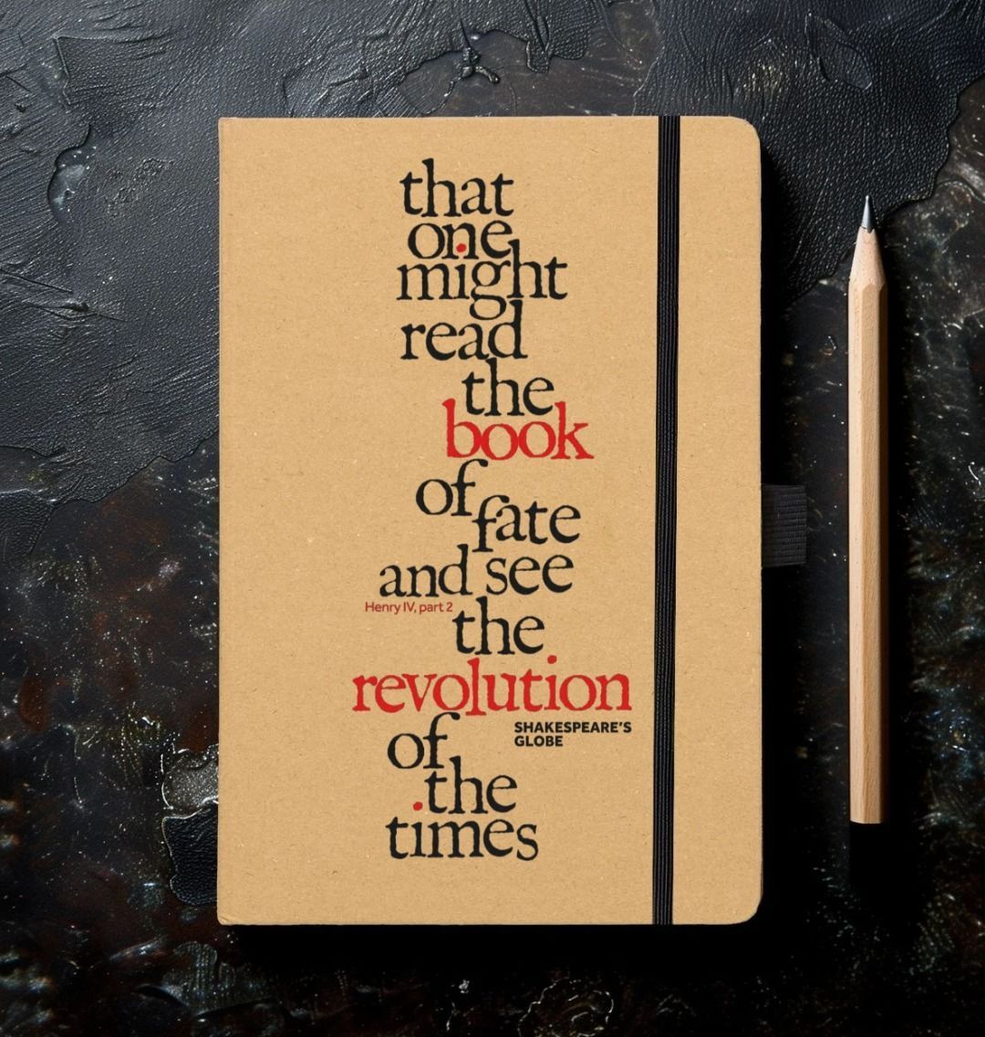 notebook with a kraft paper cover and a quote printed in black and red