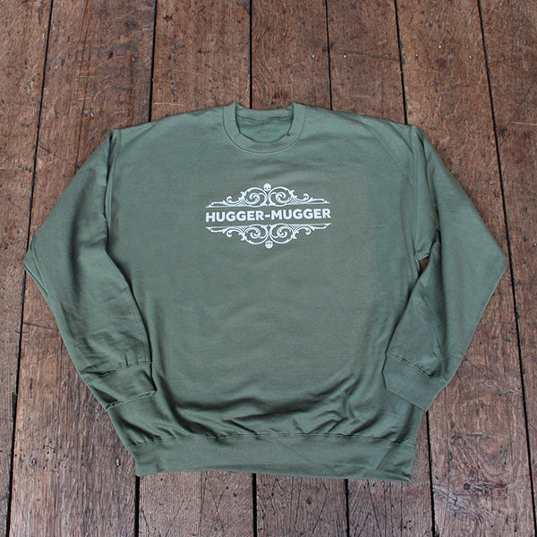 Olive green sweatshirt with white text and decorative frame design