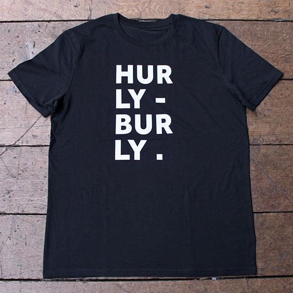 Black t-shirt with bold white graphic text aligned to the left
