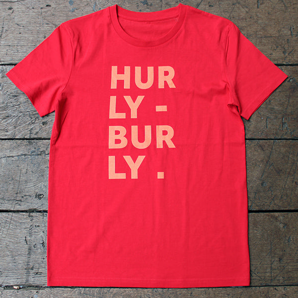 Red graphic t-shirt with orange text aligned to the left