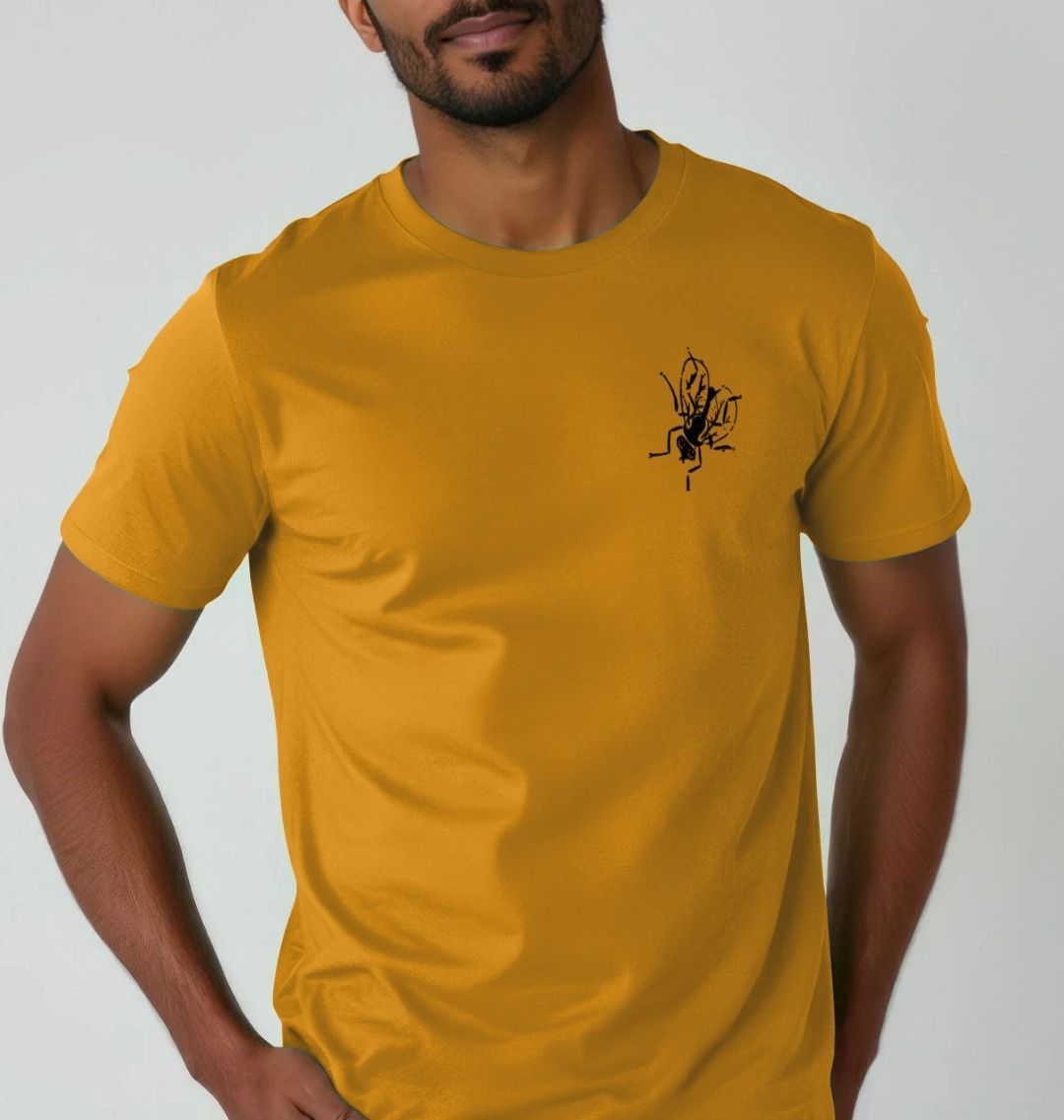 Standard fit cotton t-shirt with black fly graphic on upper left chest on yellow t-shirt