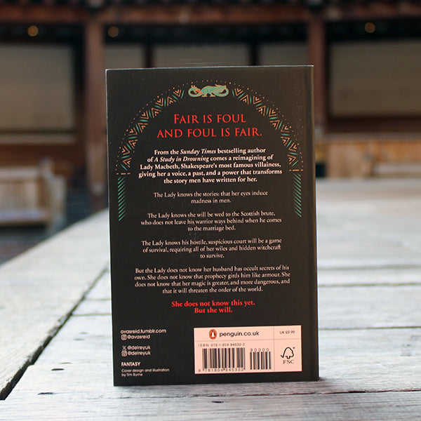 
                  
                    Black paperback book back with red and white text
                  
                