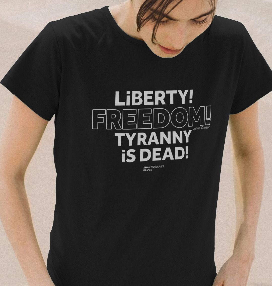 Black fitted t-shirt with centre front graphic text in white colour, all letters filled in except for the word Freedom which is outlined in white only