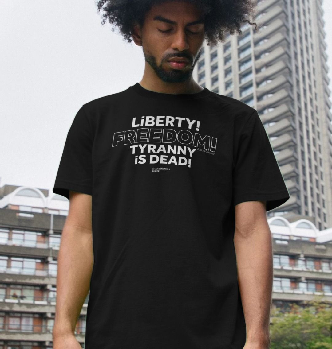 Black standard fit t-shirt with centre front graphic text in white colour, all letters filled in except for the word Freedom which is outlined in white only