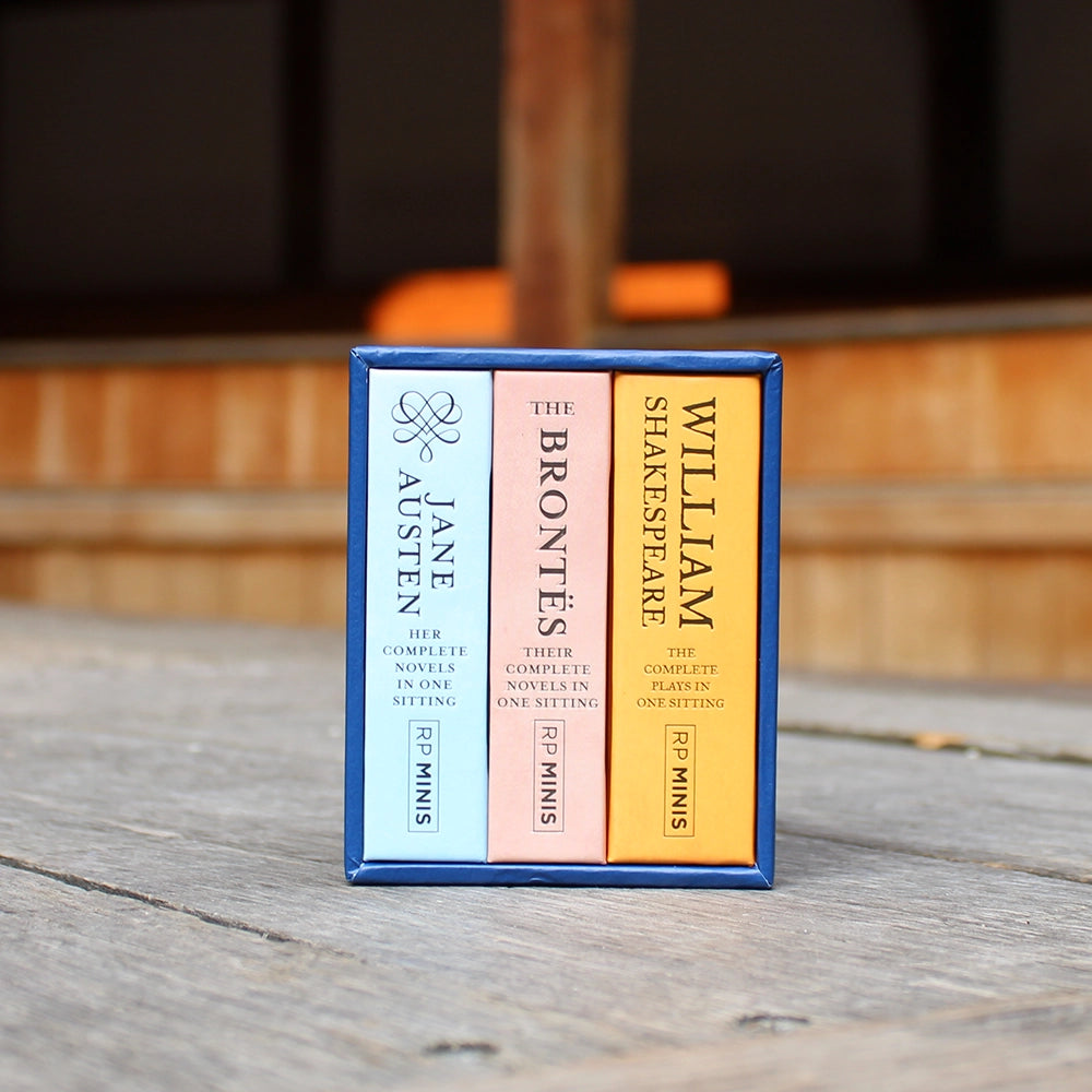 
                  
                    Royal blue box set of mini books with decorative white text, filled with 3 mini books in pale blue, pale pink, and orange
                  
                