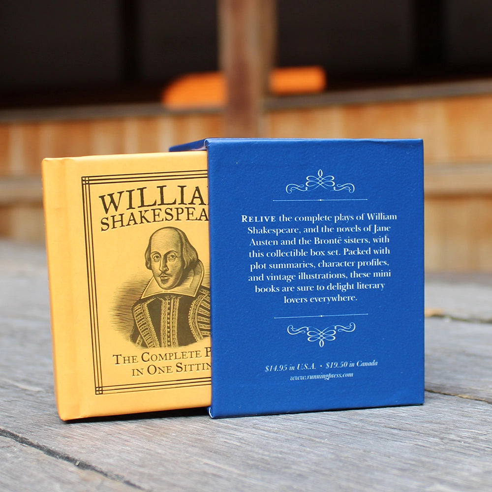 
                  
                    Royal blue box set of mini books with decorative white text, with orange book pulled out
                  
                