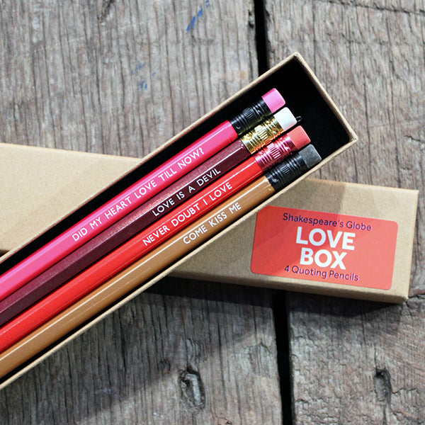 Kraft pencil box containing 4 love quote pencils, from top to bottom: magenta, burgundy, red, gold