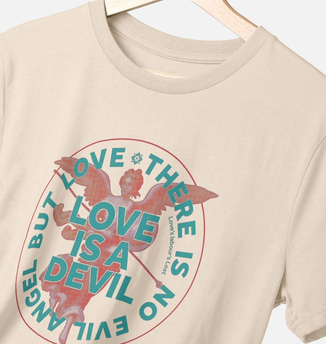 Beige t-shirt with graphic design and text on a white background