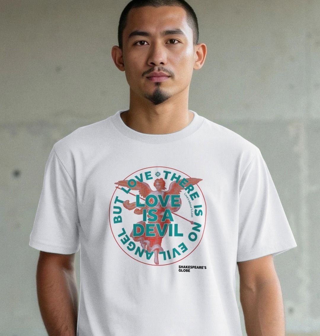 Man wearing a white t-shirt with a graphic design and text.