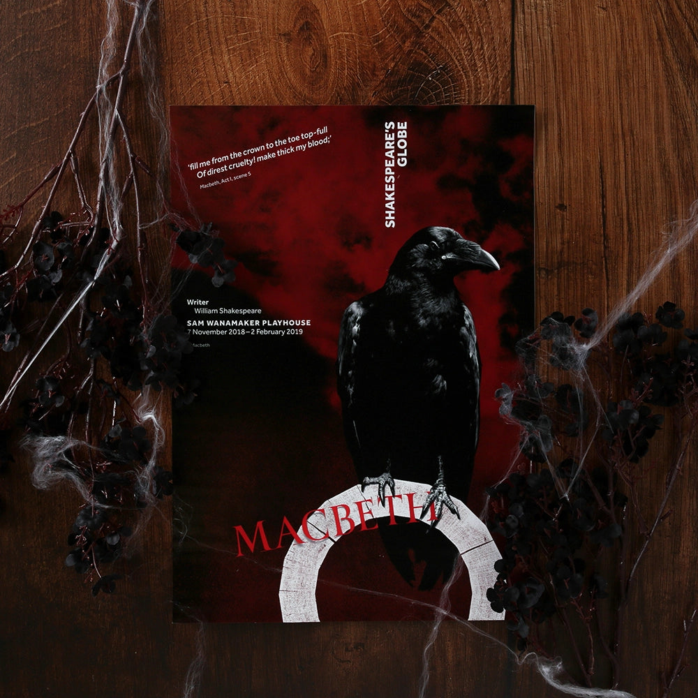 
                  
                    Poster celebrating the 2018/19 production of Macbeth in the Sam Wanamaker Playhouse at Shakespeare's Globe. The background is deep red with red smoke, in the foreground a black raven perches on a white Globe logo.
                  
                