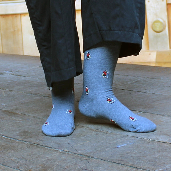Marled grey cotton blend socks with repeating pattern Macbeth approximately 1 inch apart