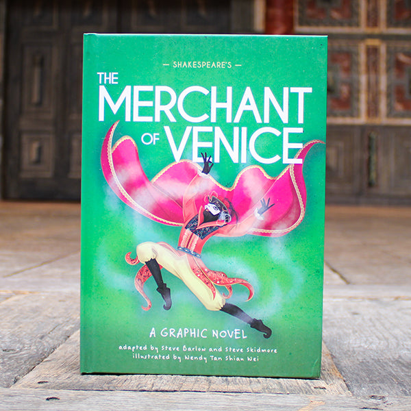 Book titled 'The Merchant of Venice' in a graphic novel format on a wooden surface.