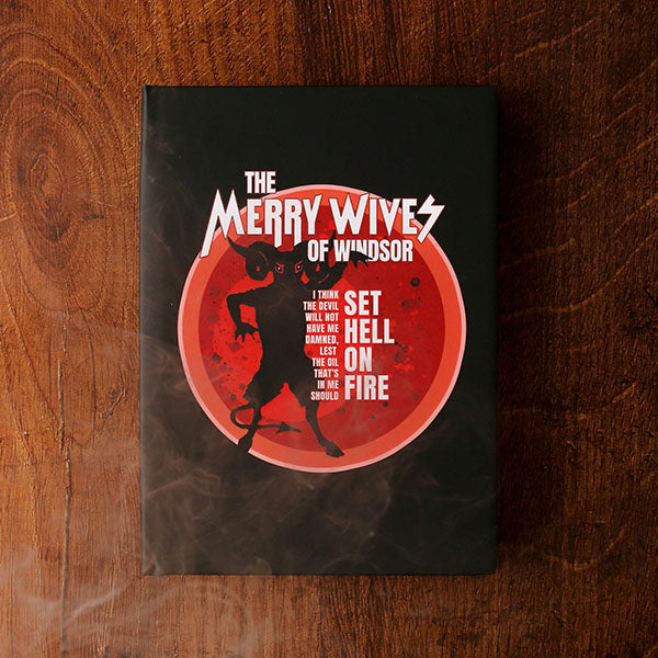 black hardback journal with a red and white print to the cover
