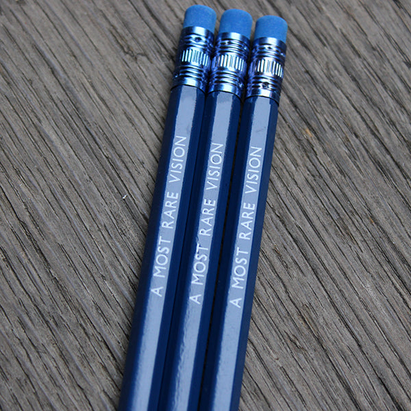 Royal blue pencil with matching eraser, stamped with white text
