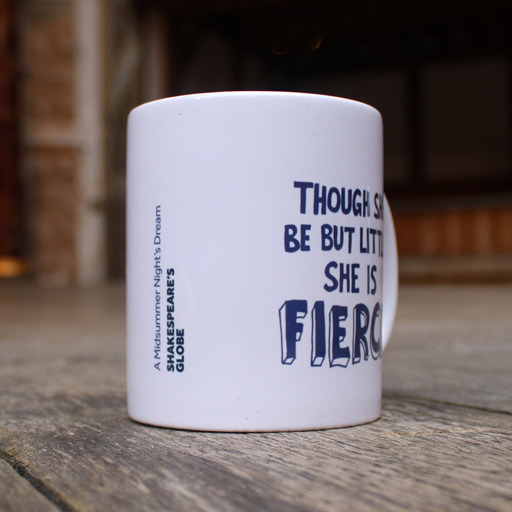 White mug with dark blue stylised 'fierce' quote graphics on either side