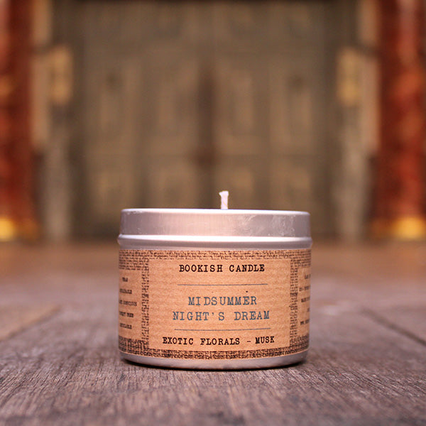 
                  
                    White potted candle in silver tin with tan coloured label surround with old time black print
                  
                