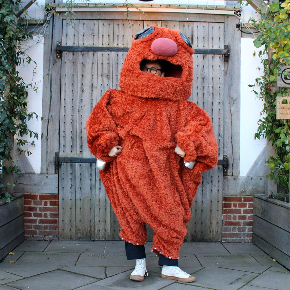 Burnt orange monster costume with oversized head