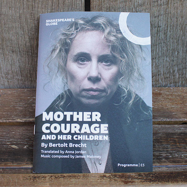 Programme for 'Mother Courage and Her Children' by Bertolt Brecht at Shakespeare's Globe on a wooden surface