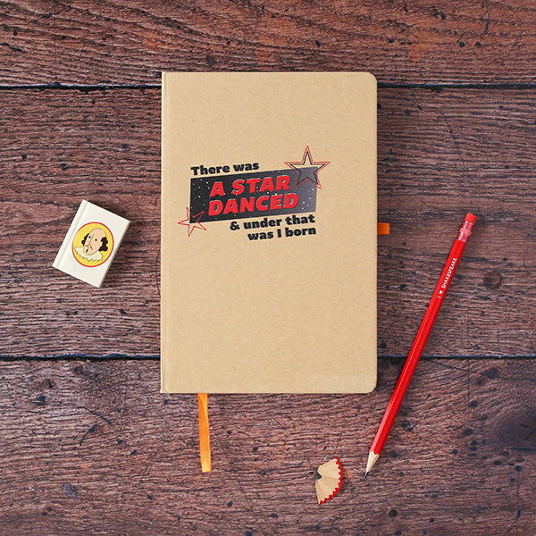 Natural colour hardback notebook with red and black graphic text image and orange band closure