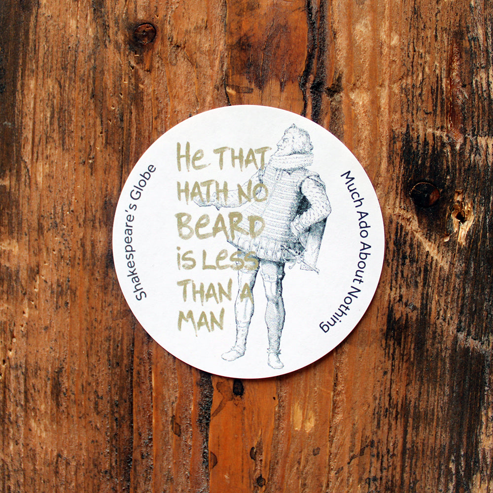 white circular sticker printed with an illustration of an Elizabethan man and a quote in hand-drawn green letters