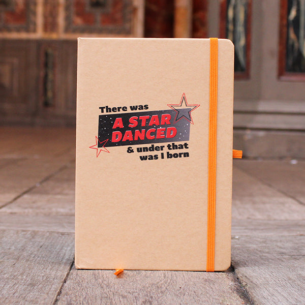 Natural colour hardback notebook with red and black graphic text image and orange band closure