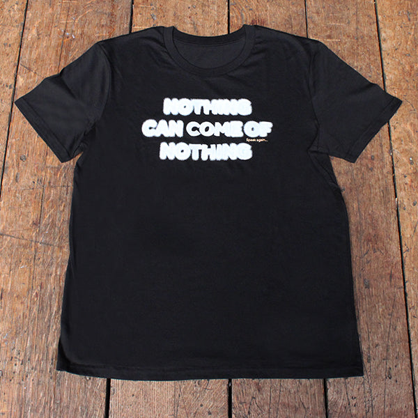 
                      
                        Black cotton t-shirt with white blurred text
                      
                    