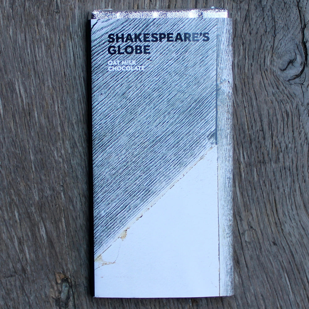 
                  
                    Foil wrapped chocolate bar with printed paper wrap indicating Shakespeare's Globe
                  
                