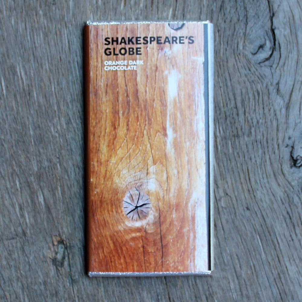 Foil wrapped chocolate bar with printed paper wrap indicating Shakespeare's Globe