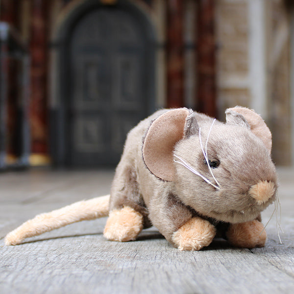 Pale brown soft toy in a rat shape with beige feet, tale, nose and inner ears