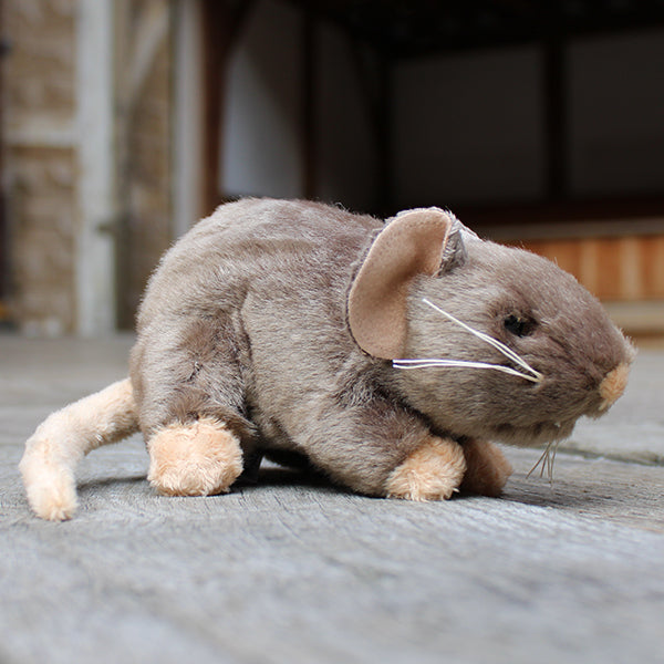 Pale brown soft toy in a rat shape with beige feet, tale, nose and inner ears