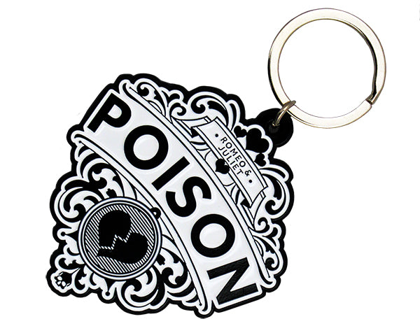 Black and white keyring on silver metal base, with black writing and black heart and skull motif