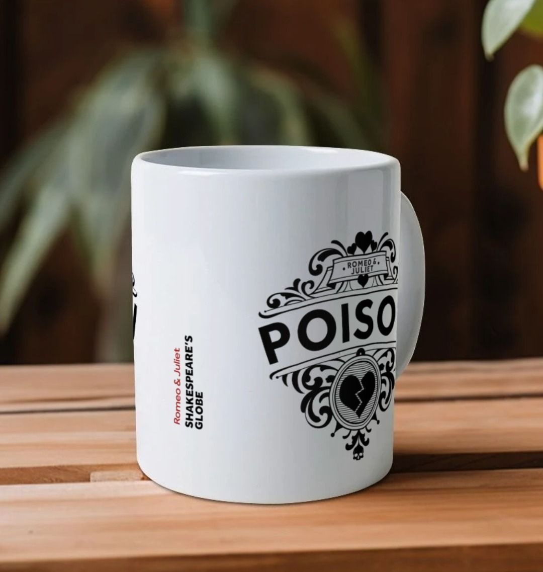 Black 'POISON' graphic motif with broken heart and curly-ques, design printed on either side of white mug