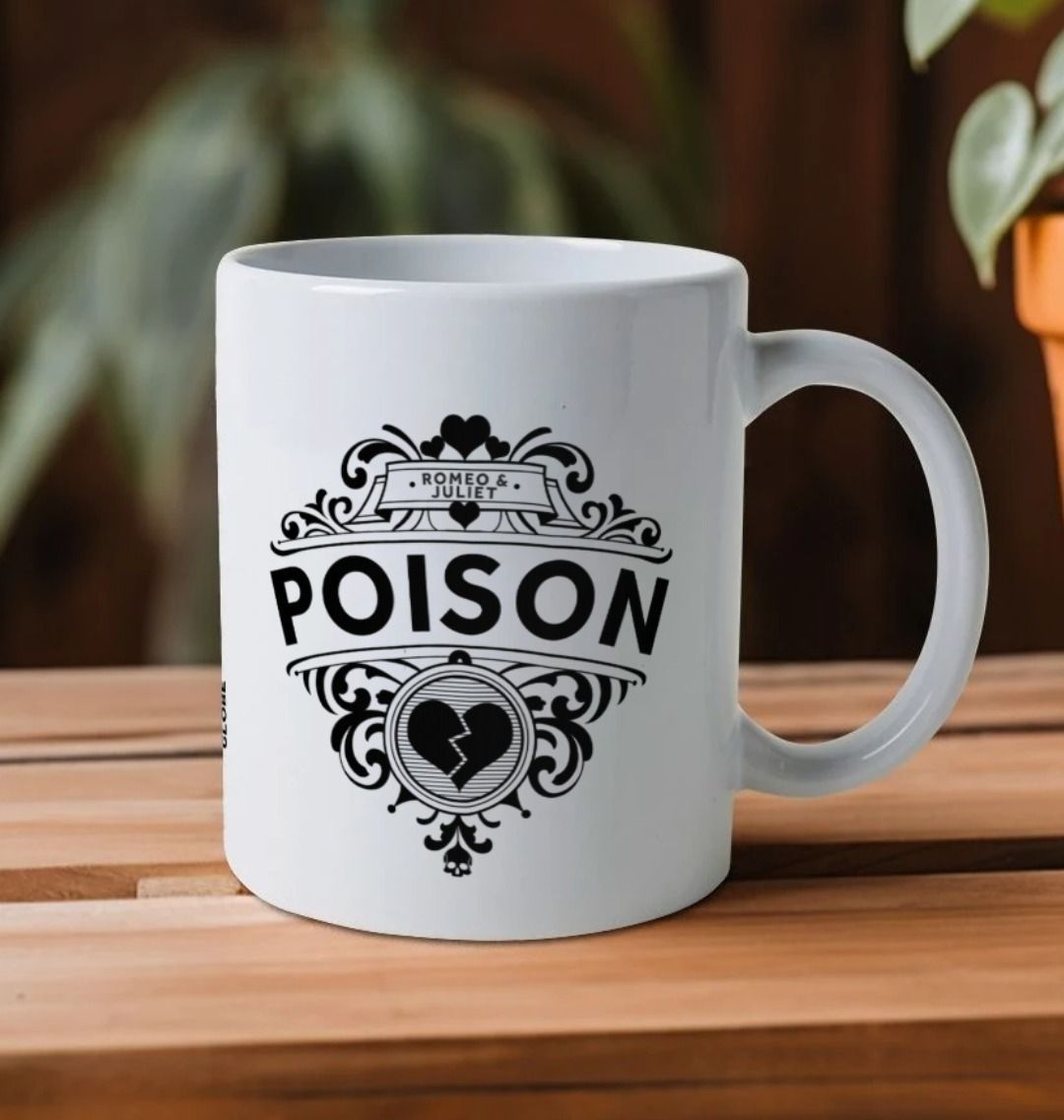 Black 'POISON' graphic motif with broken heart and curly-ques, design printed on either side of white mug