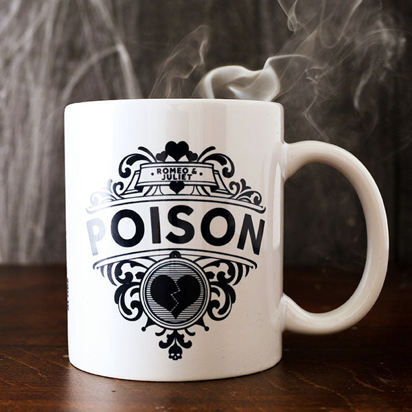 Black 'POISON' graphic motif with broken heart and curly-ques, design printed on either side of white mug