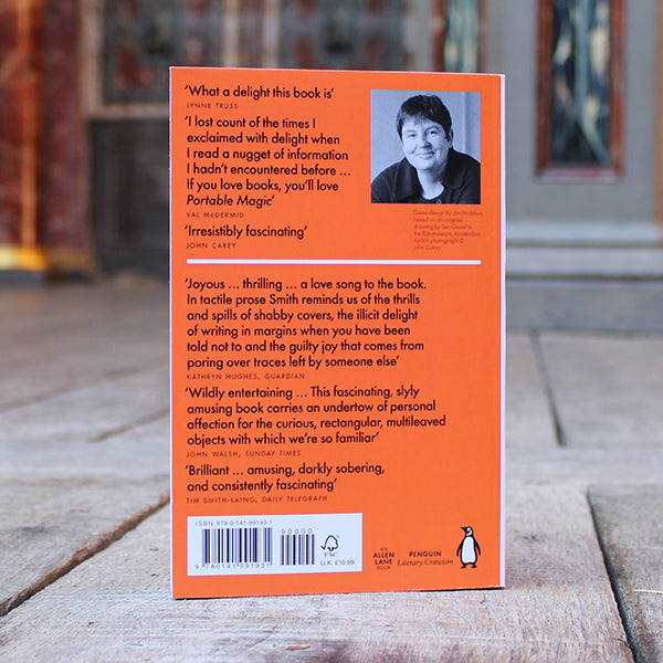 Paperback copy of 'Portable Magic' by Emma Smith sitting on a wooden stage