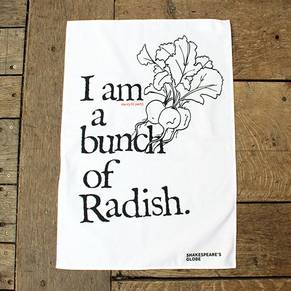 white tea towel with black text and an illustration of a bunch of radish print