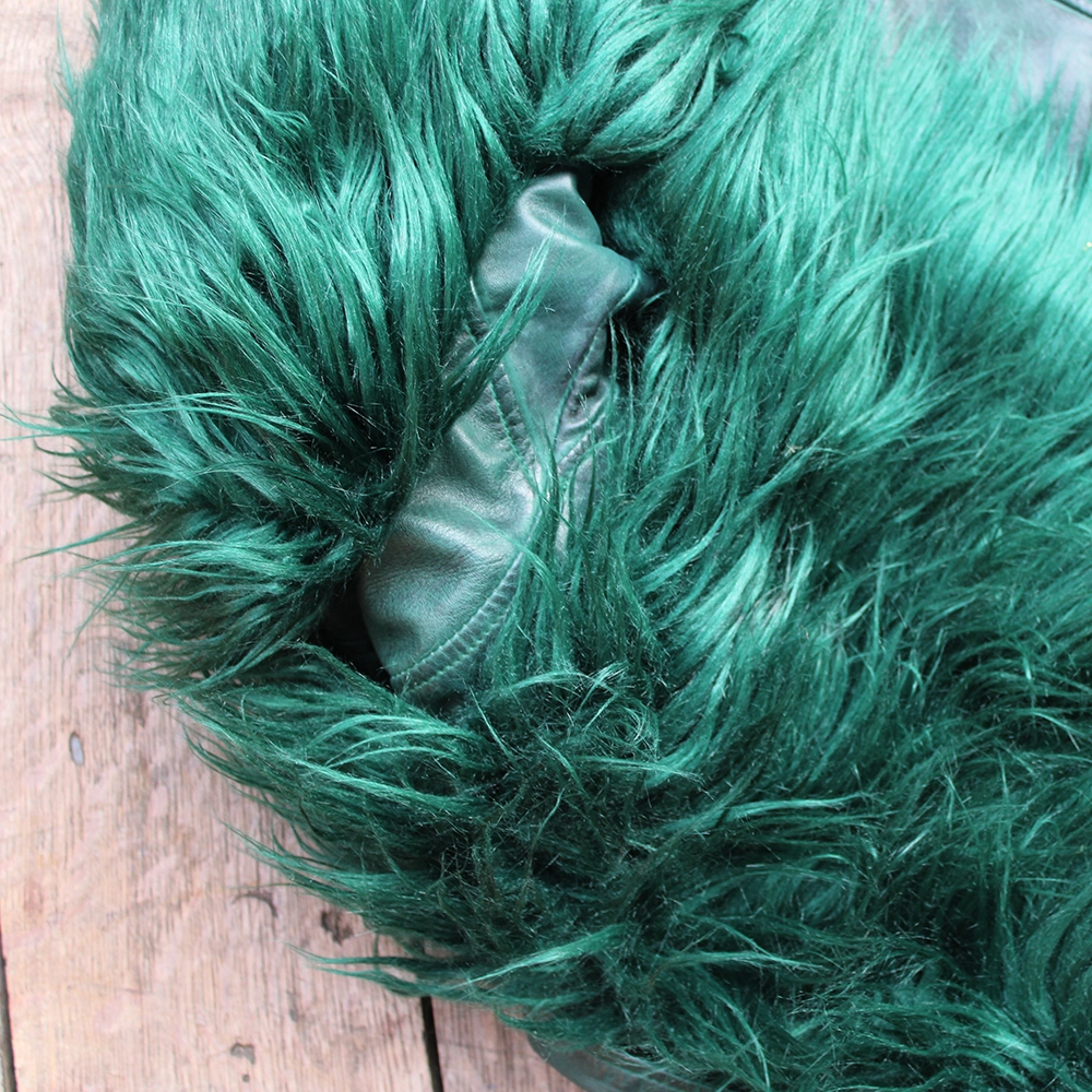 
                      
                        Forest green leather biker style jacket, closeup of matching forest green faux fur shawl added
                      
                    