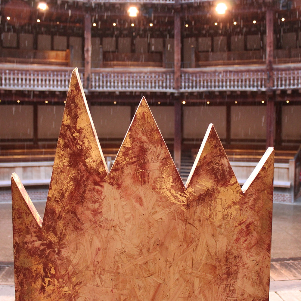 
                  
                    Chipboard throne from Richard III production at Shakespeare's Globe 2024, throne has jagged cut top and is mounted on chipboard base
                  
                