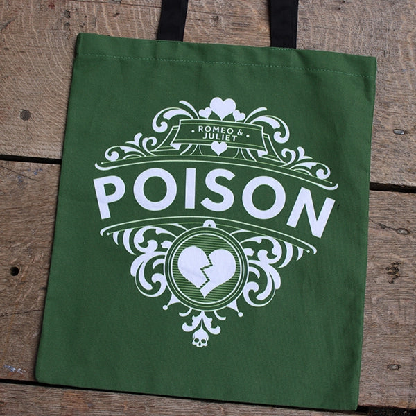 
                      
                        Olive green cotton tote bag with 2 black handles, featuring white graphic and POISON text
                      
                    