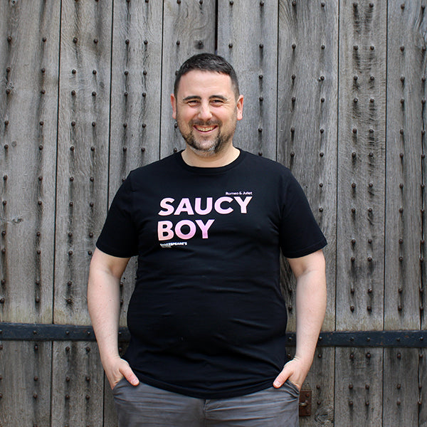 black crew neck t-shirt with a pink text print to the chest