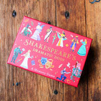 red box with shakespeare characters on the lid on a wooden surface