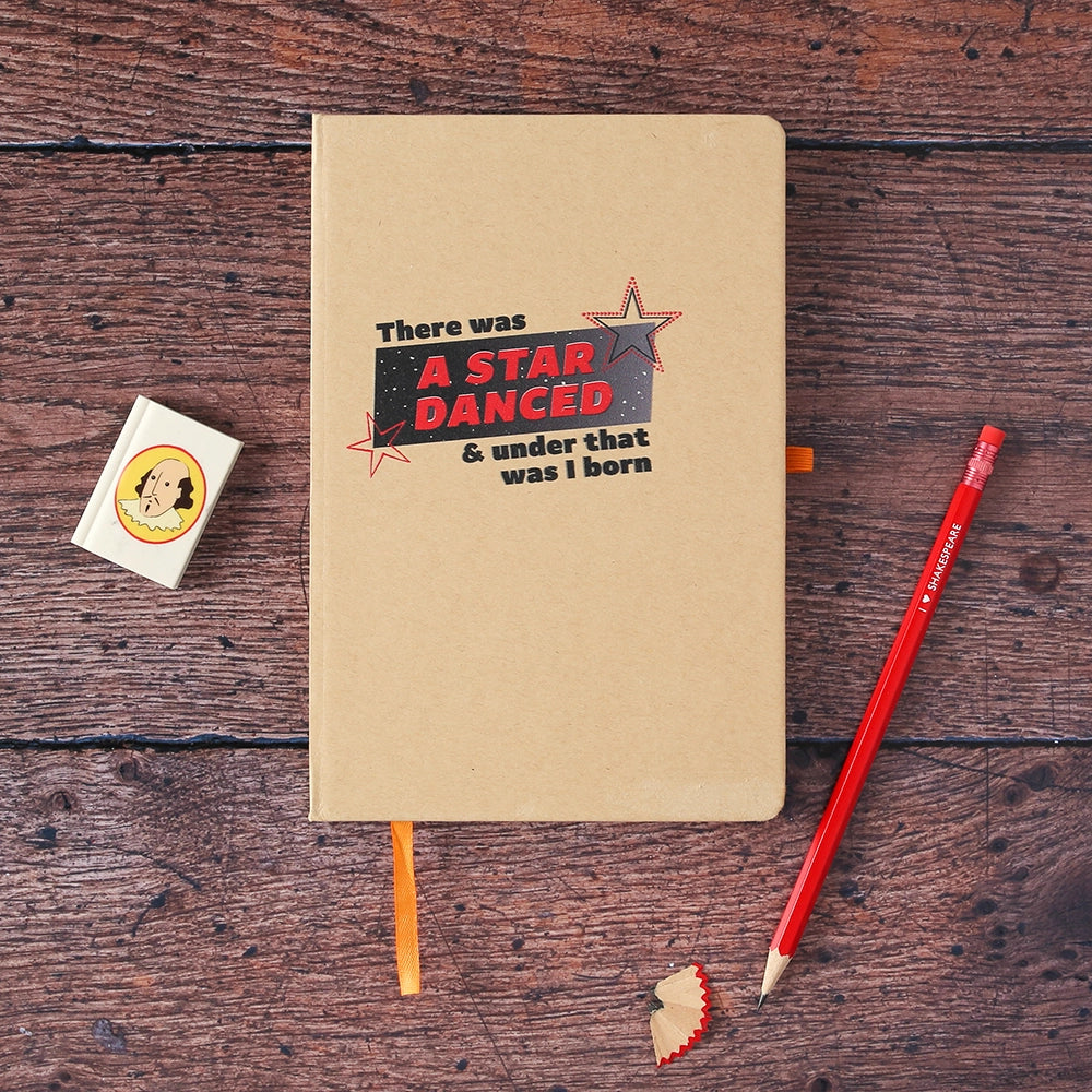 Natural colour hardback notebook with red and black graphic text image and orange band closure